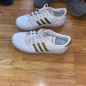 Adidas White Sneakers with Gold Stripes